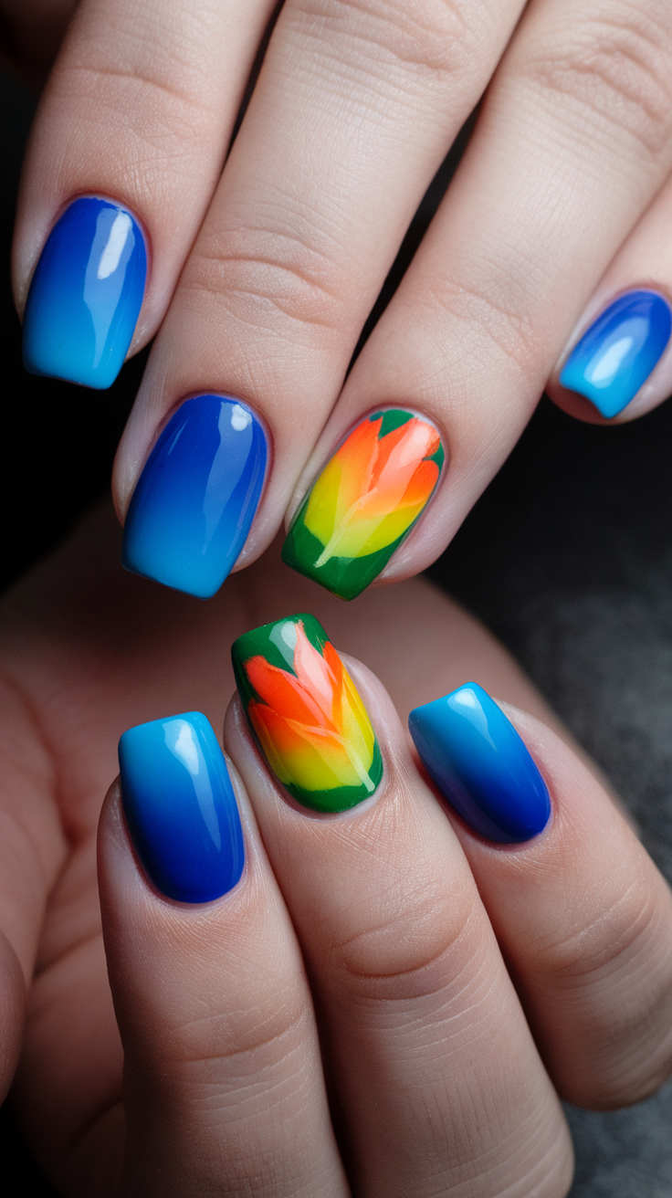 Nail art featuring electric blue colors and colorful floral designs.