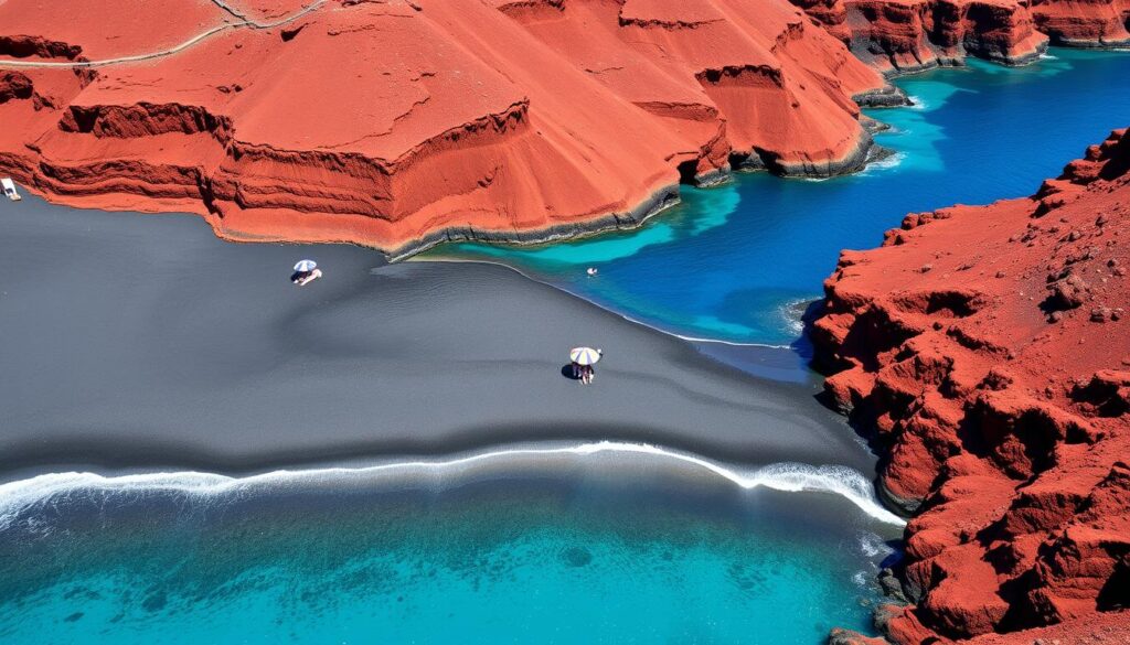 Red Beach in Santorini with dramatic red volcanic cliffs and deep blue waters Red Beach in Santorini with dramatic red volcanic cliffs and deep blue waters